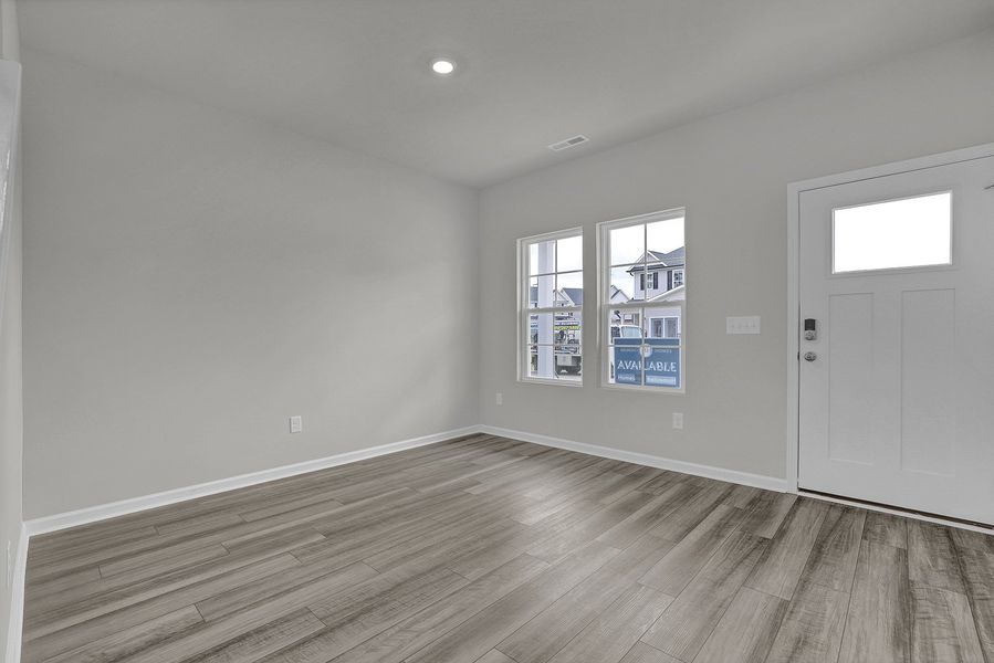 Spacious, unfurnished interior of a new home in River Tide Farms, Bolivia (Image 11).