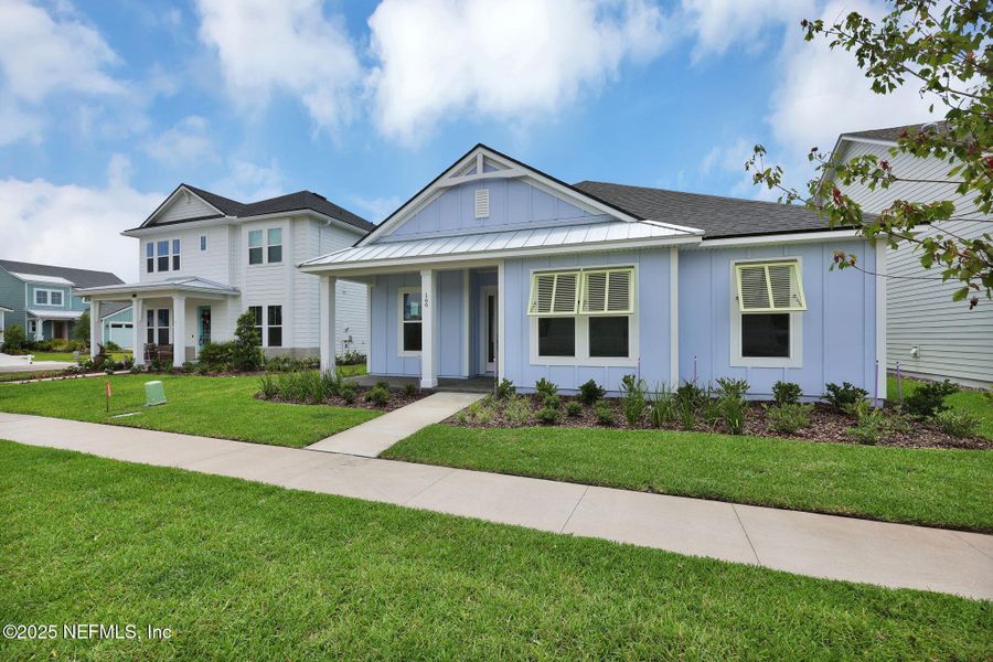 Front exterior of a new home in Seabrook Village at Seabrook, Nocatee, FL, highlighting curb appeal (Image 24).
