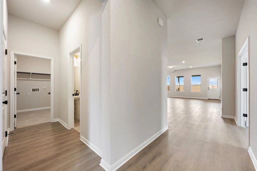 Spacious, unfurnished interior of a new home in The Colony 50s, Bastrop (Image 24).