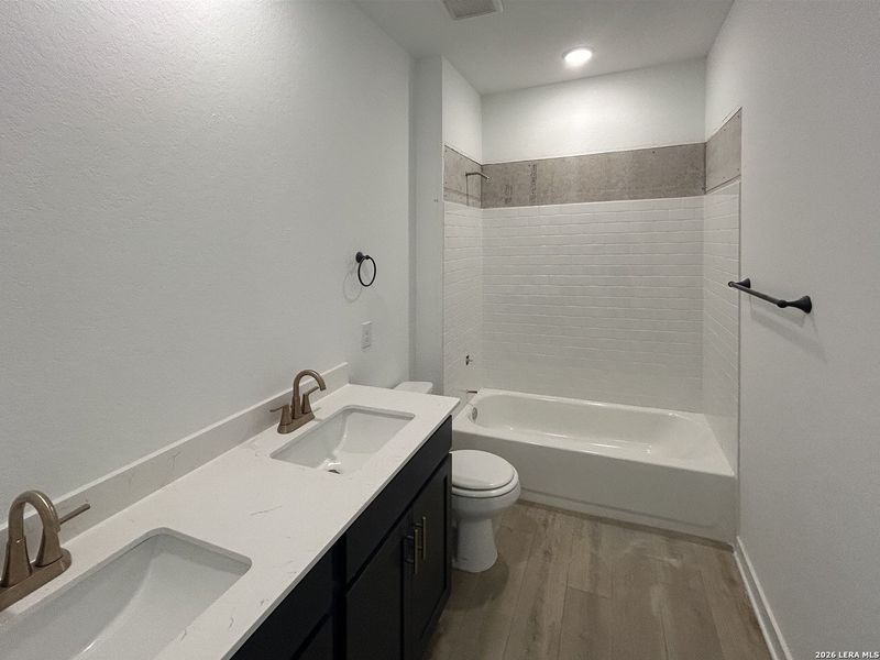 Furnished interior view inside a new home in Hennersby Hollow, San Antonio (Image 9).