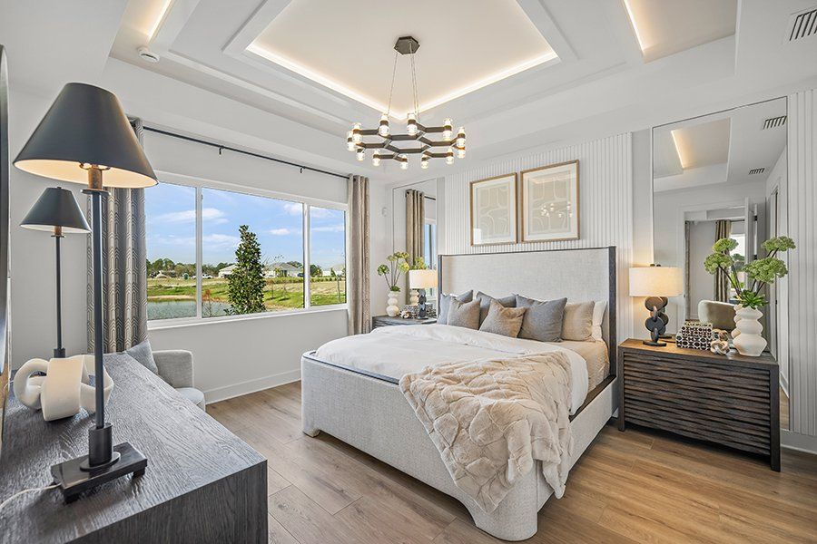 Representative furnished interior of a home built from the Regatta by Homes by Towne in Shellstone at Waterside, Sarasota (Image 12).