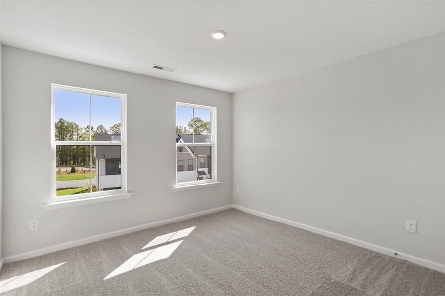 Spacious, unfurnished interior of a new home in Sweetbrier, Durham (Image 27).