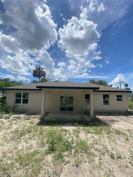Front exterior of a new home in , Deland, FL, highlighting curb appeal (Image 1).
