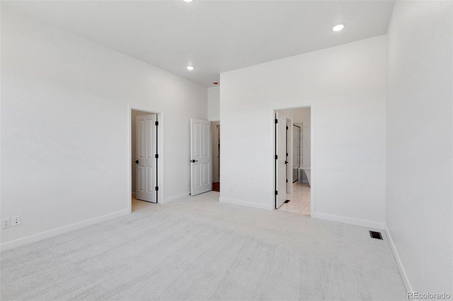 Spacious, unfurnished interior of a new home in Highlands Preserve, Mead (Image 19).