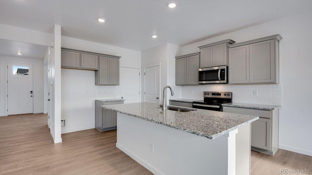 Furnished interior view inside a new home in Settlers Crossing, Commerce City (Image 16).