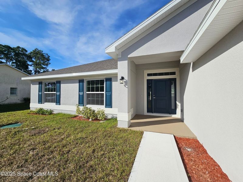 Exterior details and patio area of a home in Palm Bay, Palm Bay (Image 2). Exterior details and patio area of a home in Palm Bay, Palm Bay (Image 2).
