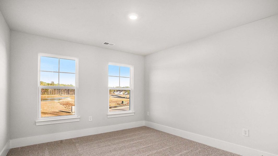 Spacious, unfurnished interior of a new home in Coastal Farms, Conway (Image 15). Spacious, unfurnished interior of a new home in Coastal Farms, Conway (Image 15).