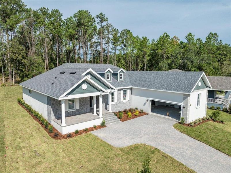 Front exterior of a new home in Southern Hills Plantation, Brooksville, FL, highlighting curb appeal (Image 20).