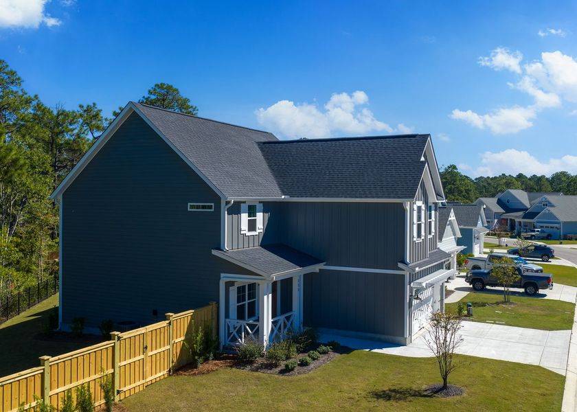 Front exterior of a new home in Carolina Creek, Hampstead, NC, highlighting curb appeal (Image 22).