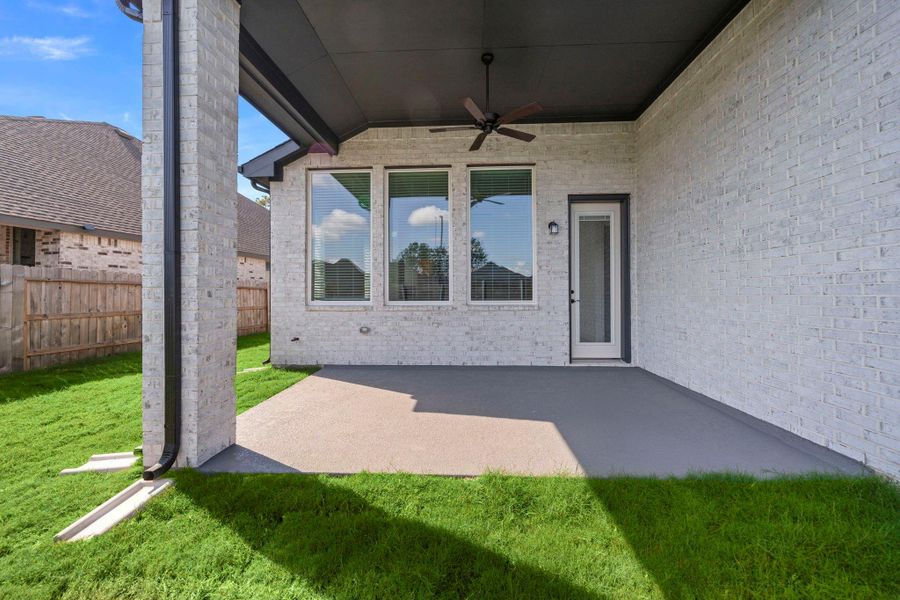 Exterior details and patio area of a home in Artavia, Conroe (Image 3).