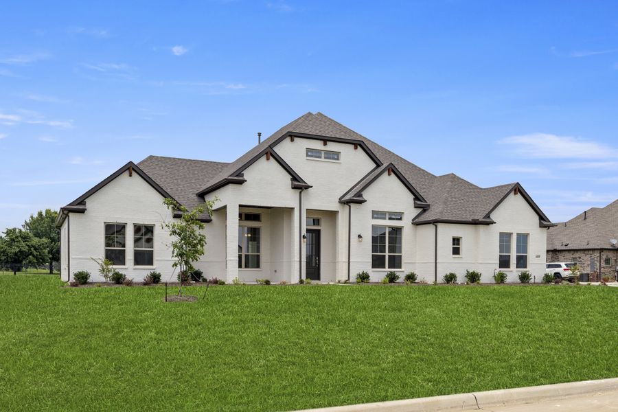 Representative exterior photo of a completed home built from the Wildwood SE by Sandlin Homes in Settler's Glen, New Fairview, TX (Image 24).