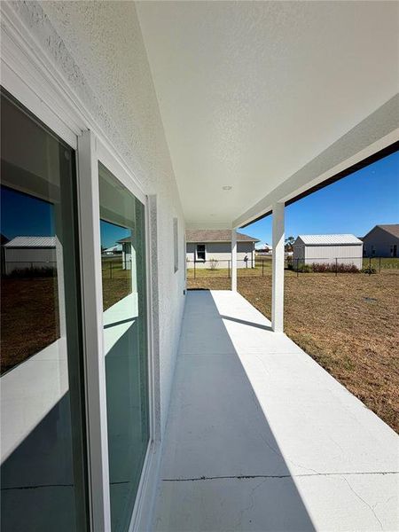 Exterior details and patio area of a home in , Sebring (Image 25).