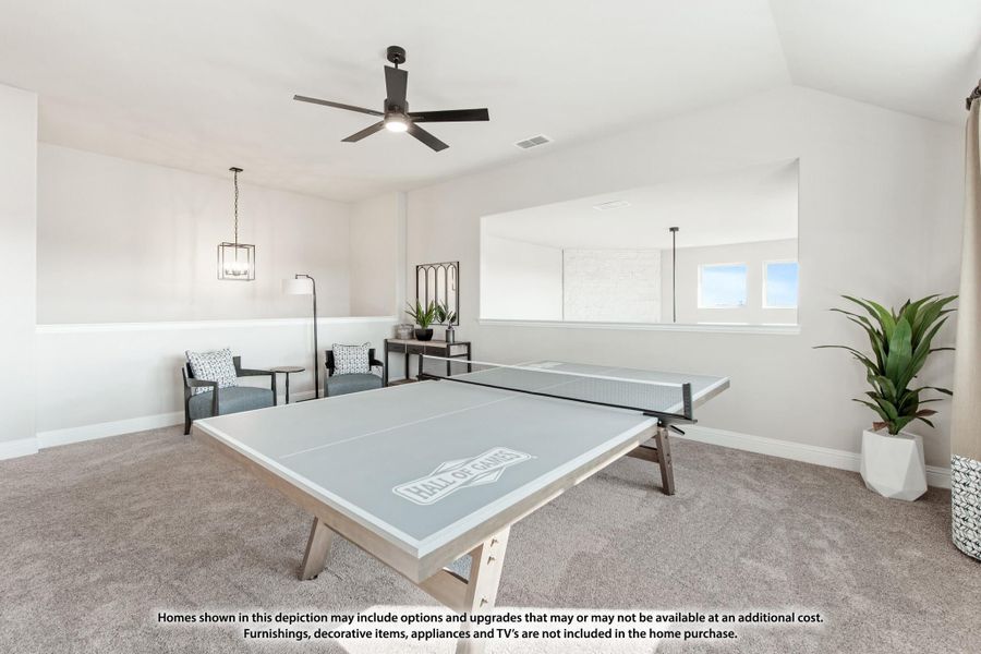 Game room with ping pong table, carpet flooring, ceiling fan, and seating area Game room with ping pong table, carpet flooring, ceiling fan, and seating area