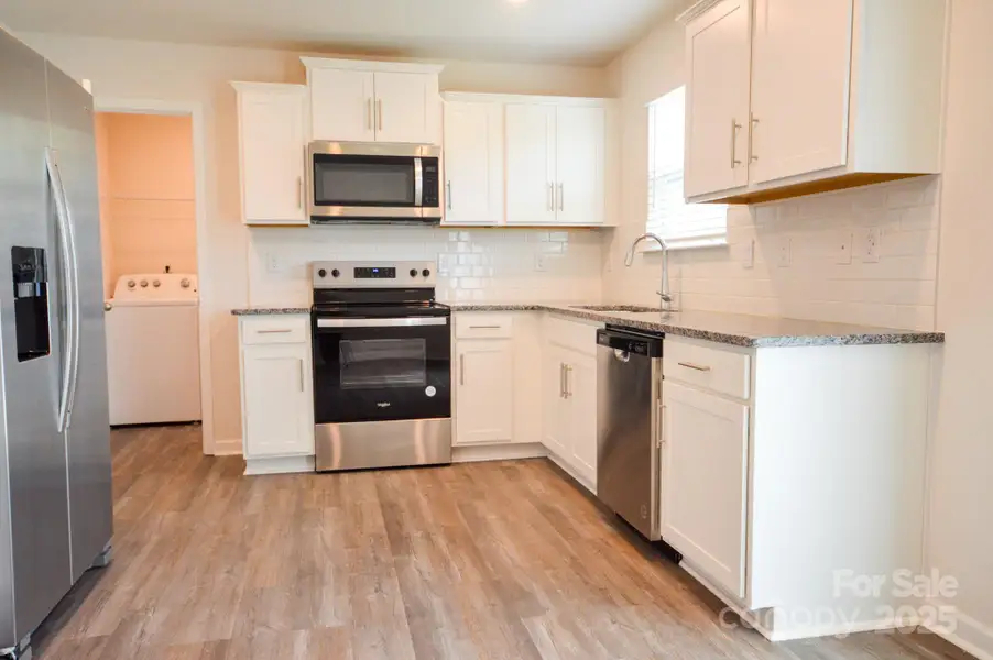 Furnished interior view inside a new home in Aberdeen Place, Asheville (Image 3).