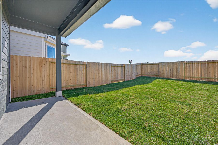 Exterior details and patio area of a home in Ridgeland Hills, Willis (Image 3).