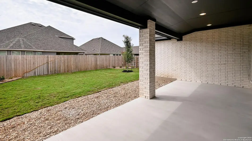 Exterior details and patio area of a home in Legacy At Lake Dunlap 50', New Braunfels (Image 4). Exterior details and patio area of a home in Legacy At Lake Dunlap 50', New Braunfels (Image 4).