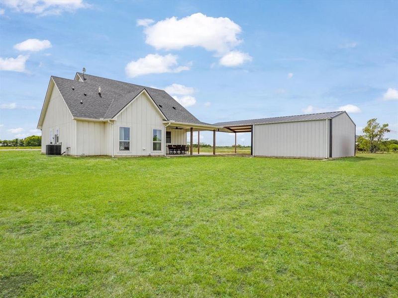 Exterior details and patio area of a home in , Bells (Image 24).