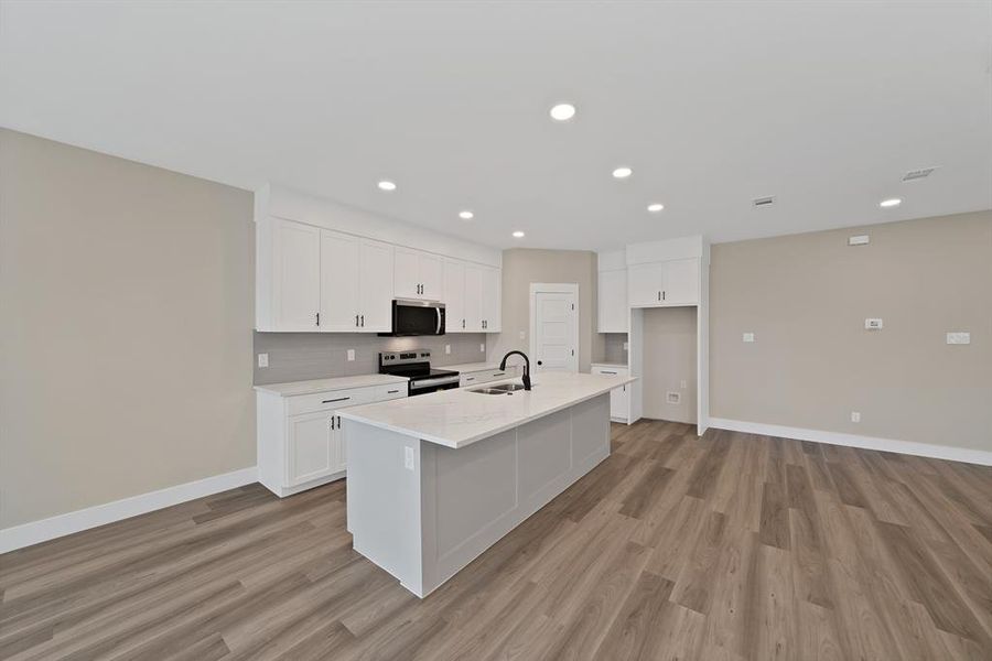 Furnished interior view inside a new home in , The Colony (Image 7).