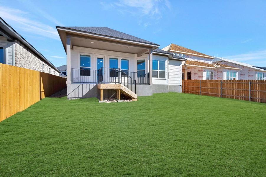 Exterior details and patio area of a home in Heritage, Dripping Springs (Image 21).