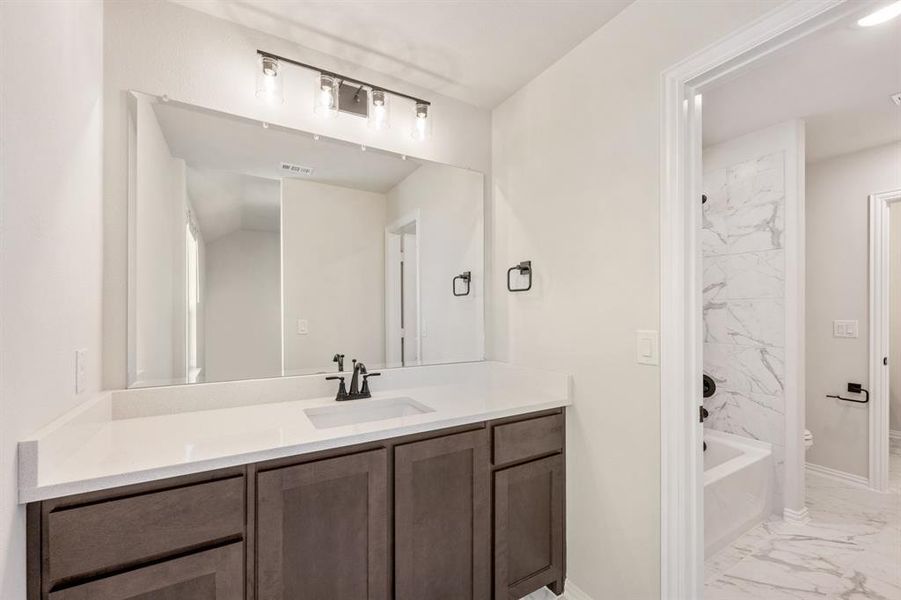 Furnished interior view inside a new home in Creekview Meadows, Pilot Point (Image 13).