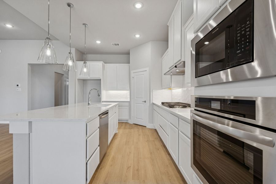 Representative furnished interior of a home built from the Halsted by Centre Living Homes in Ellis Ranch Estates, Waxahachie (Image 10).