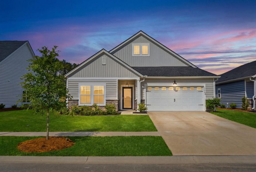 Front exterior of a new home in Horizons at Summers Corner | 55+, Summerville, SC, highlighting curb appeal (Image 2).