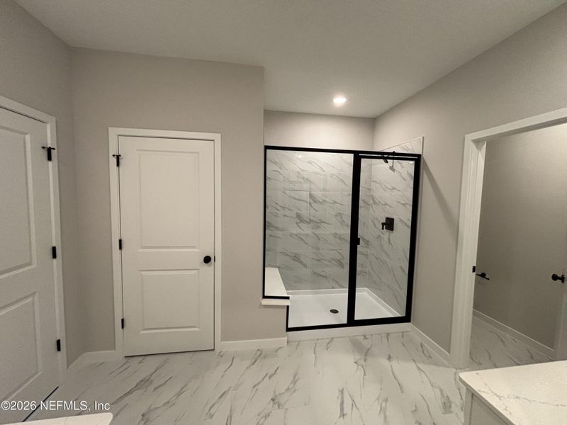 Spacious, unfurnished interior of a new home in The Cypress Series at Reserve East, Flagler Beach (Image 31).