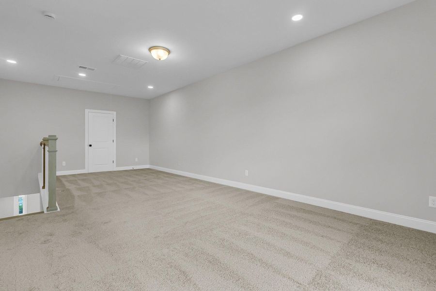 Spacious, unfurnished interior of a new home in Tidewater at Lakes of Cane Bay, Summerville (Image 25). Spacious, unfurnished interior of a new home in Tidewater at Lakes of Cane Bay, Summerville (Image 25).