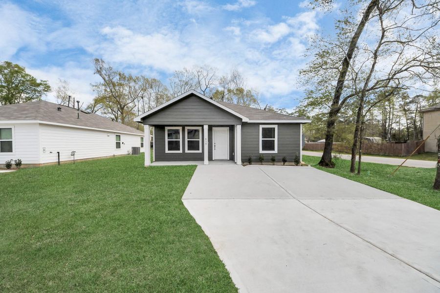 Front exterior of a new home in , Cleveland, TX, highlighting curb appeal (Image 15). Front exterior of a new home in , Cleveland, TX, highlighting curb appeal (Image 15).