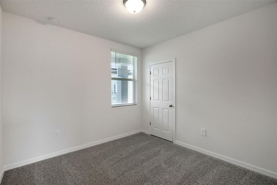 Spacious, unfurnished interior of a new home in Villamar - Classic Series, Winter Haven (Image 26).