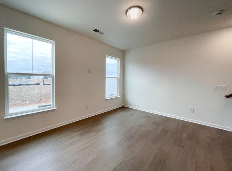 Spacious, unfurnished interior of a new home in Bellevue Townhomes, Greenville (Image 15).