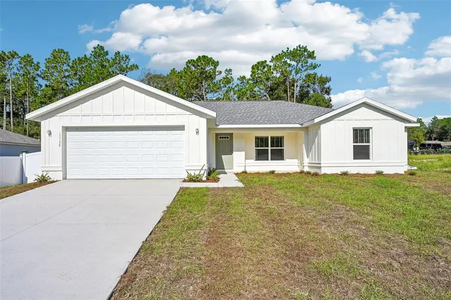 Front exterior of a new home in , Ocala, FL, highlighting curb appeal (Image 1). Front exterior of a new home in , Ocala, FL, highlighting curb appeal (Image 1).