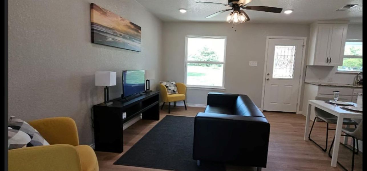 View from bedroom #2 toward the open living / dining area. View from bedroom #2 toward the open living / dining area.