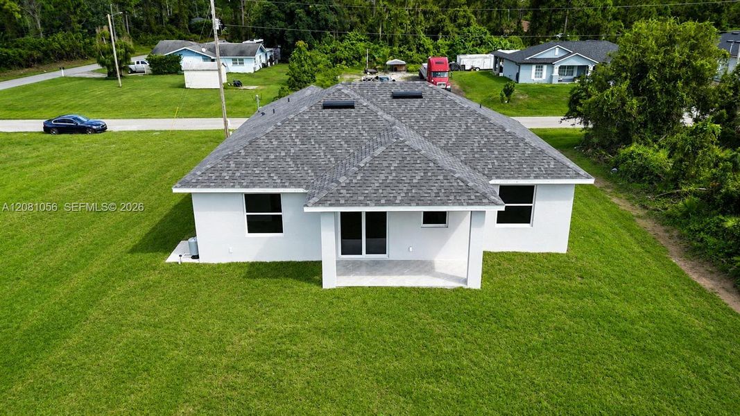 Exterior details and patio area of a home in , Lehigh Acres (Image 3).
