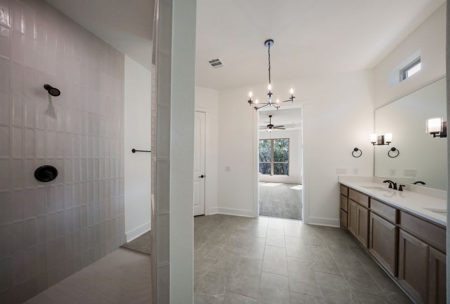 Representative furnished interior of a home built from the The Travis by Whitestone Custom Homes in Johnson Ranch, Bulverde (Image 16).
