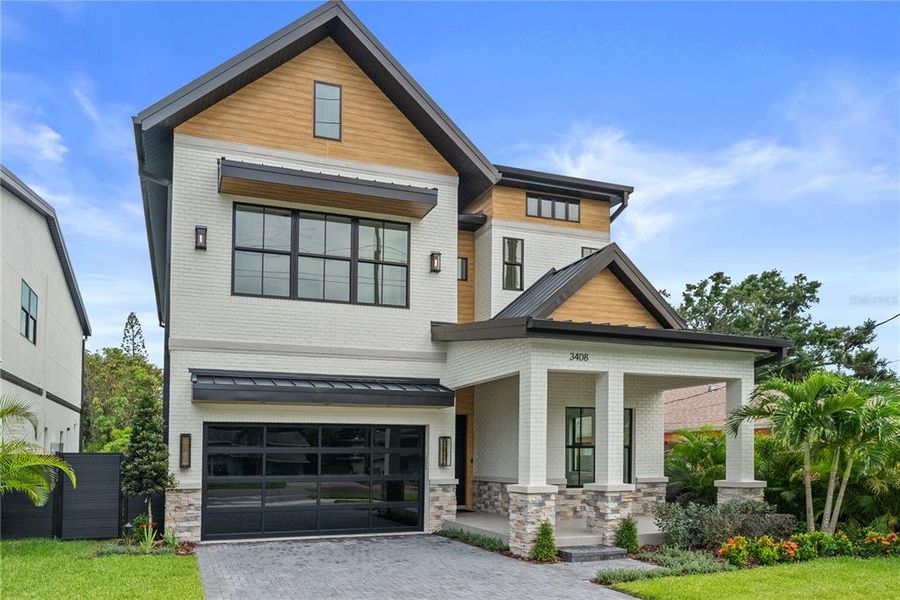 Front exterior of a new home in , Tampa, FL, highlighting curb appeal (Image 23). Front exterior of a new home in , Tampa, FL, highlighting curb appeal (Image 23).