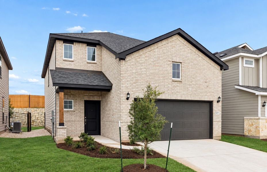 Front exterior of a new home in Cameron Place, Austin, TX, highlighting curb appeal (Image 17). Front exterior of a new home in Cameron Place, Austin, TX, highlighting curb appeal (Image 17).