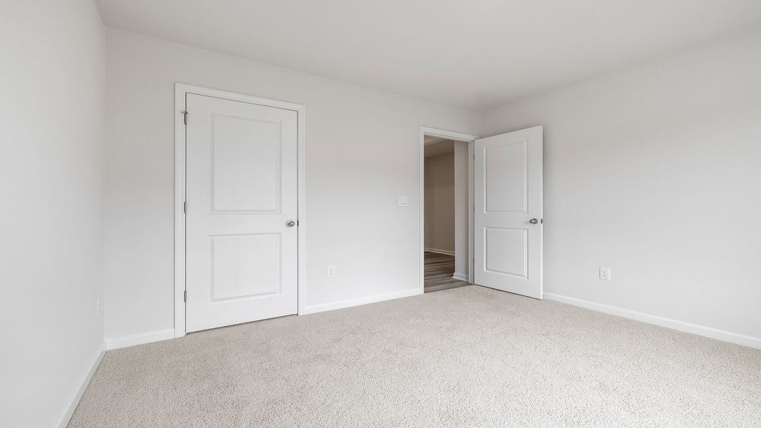 Spacious, unfurnished interior of a new home in Durbin Meadows Traditions, Fountain Inn (Image 16).