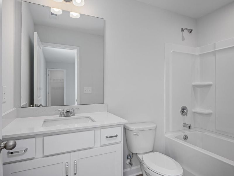 Furnished interior view inside a new home in Woodland Crossing, Zebulon (Image 9).