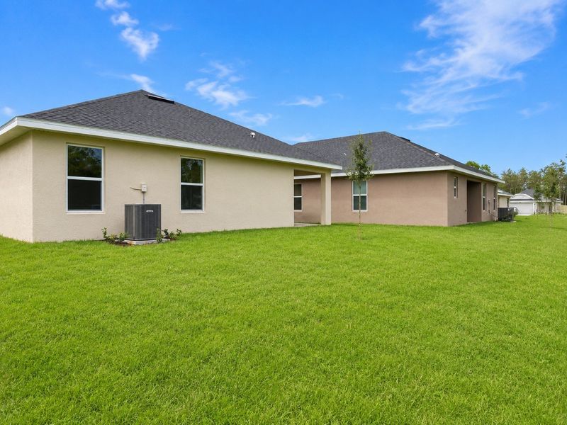 Exterior details and patio area of a home in Harmony Central, St. Cloud (Image 15).