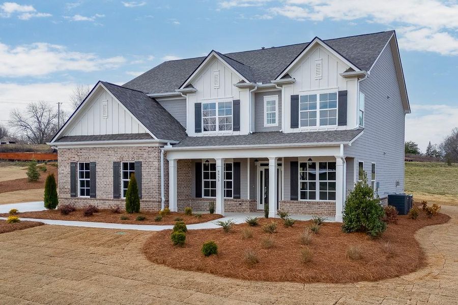Front exterior of a new home in , Gainesville, GA, highlighting curb appeal (Image 23). Front exterior of a new home in , Gainesville, GA, highlighting curb appeal (Image 23).
