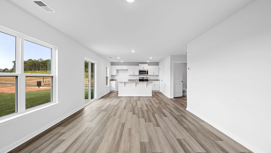 Spacious, unfurnished interior of a new home in Bentley Park, Greenwood (Image 22).