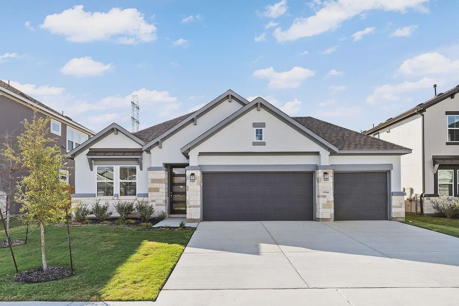 Front exterior of a new home in Enclave at Cele, Pflugerville, TX, highlighting curb appeal (Image 1). Front exterior of a new home in Enclave at Cele, Pflugerville, TX, highlighting curb appeal (Image 1).