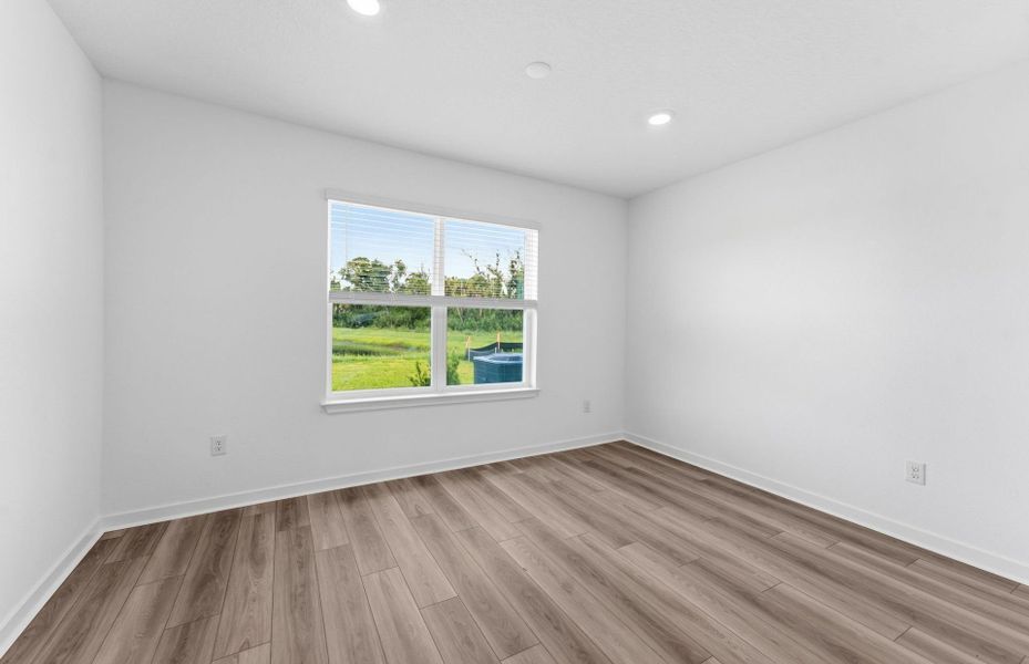 Spacious, unfurnished interior of a new home in Oakfield Trails, Parrish (Image 13).