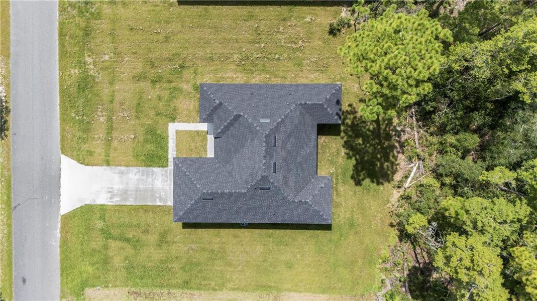 Front exterior of a new home in , Ocala, FL, highlighting curb appeal (Image 29).