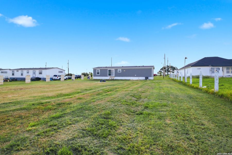 Exterior details and patio area of a home in , Atascosa (Image 19).