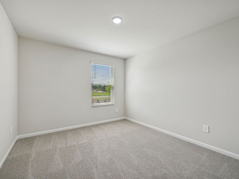 Spacious, unfurnished interior of a new home in River Glen, Angier (Image 22).