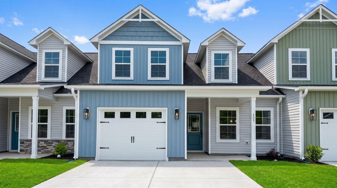Front exterior of a new home in Autumn Trail, Bolivia, NC, highlighting curb appeal (Image 1). Front exterior of a new home in Autumn Trail, Bolivia, NC, highlighting curb appeal (Image 1).