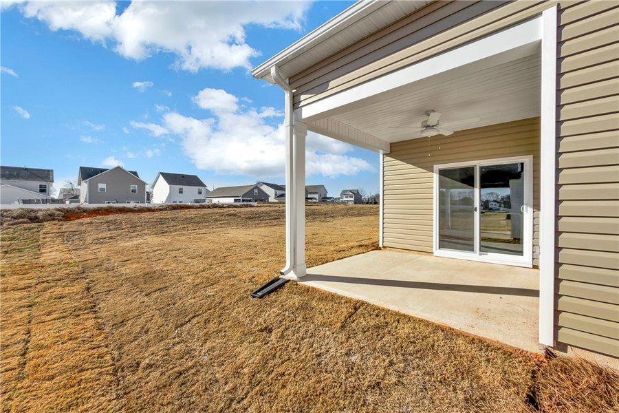 Exterior details and patio area of a home in Brownstone Park, Easley (Image 4).