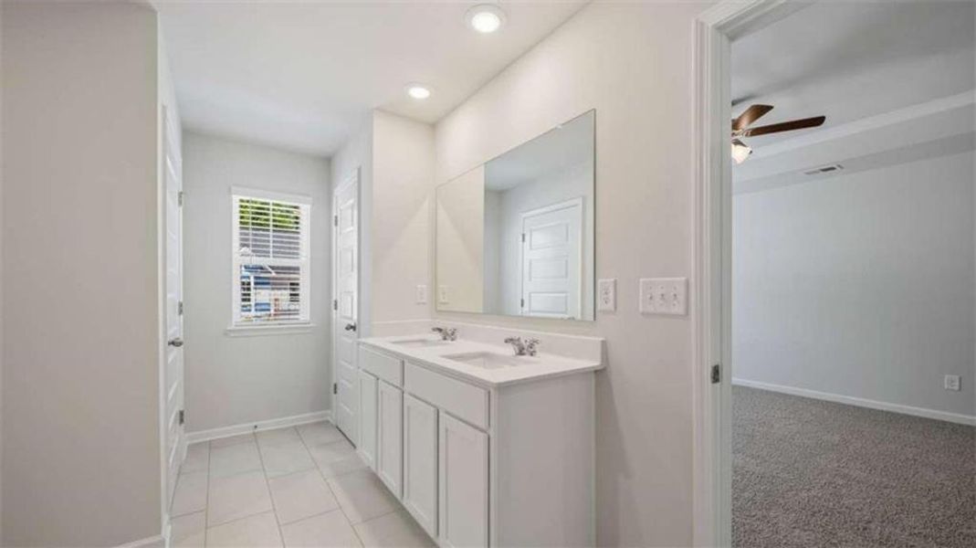 Furnished interior view inside a new home in Inverness at Sugarloaf, Lawrenceville (Image 9).